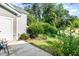 Backyard featuring a concrete patio and greenery at 4732 Altha St, Raleigh, NC 27606