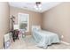 Bedroom featuring a bed, art easel, and a window with natural light at 4732 Altha St, Raleigh, NC 27606