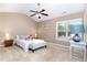 Bright main bedroom with vaulted ceiling, ceiling fan and natural light at 4732 Altha St, Raleigh, NC 27606