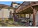 Exterior view of a home with a spacious deck and patio area, ideal for outdoor living at 506 Tirzah Dr, Lillington, NC 27546