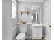 The bathroom has a toilet and sink at 506 Tirzah Dr, Lillington, NC 27546