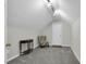 Well-lit bonus room featuring neutral carpet, chair, and a decorative console table at 506 Tirzah Dr, Lillington, NC 27546