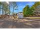 Detached garage with ample storage space, perfect for hobbies or workshop at 506 Tirzah Dr, Lillington, NC 27546