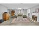 Finished basement living area features a fireplace, wet bar, and comfy sectional sofa at 506 Tirzah Dr, Lillington, NC 27546