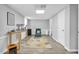 Finished basement sitting area with neutral walls and a large window at 506 Tirzah Dr, Lillington, NC 27546