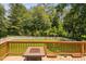 Large backyard with deck and a fire pit, perfect for outdoor entertainment at 5125 Pinehall Wynd, Raleigh, NC 27604