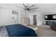 Spacious primary bedroom featuring a ceiling fan and sitting area at 5125 Pinehall Wynd, Raleigh, NC 27604