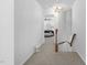 Bright hallway leading to bedroom with neutral carpet and white walls at 5125 Pinehall Wynd, Raleigh, NC 27604