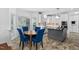 Eat-in kitchen with updated appliances, modern cabinetry, and large windows at 5125 Pinehall Wynd, Raleigh, NC 27604