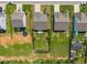 Overhead of home with spacious yard, landscaping, and backyard patio at 515 Legacy Dr, Youngsville, NC 27596