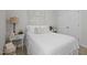 Inviting bedroom featuring a comfortable bed, stylish side table, and serene decor at 515 Legacy Dr, Youngsville, NC 27596