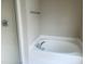 Bathroom featuring a separate soaking tub and shower at 5908 Abbington Way, Raleigh, NC 27610