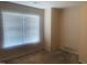 Neutral bedroom with window and blinds at 5908 Abbington Way, Raleigh, NC 27610