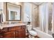 Charming bathroom featuring a large vanity, tiled shower, and soaking tub at 610 Bennett Mountain, Chapel Hill, NC 27516