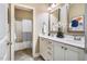 Bathroom featuring double vanities, and a separate toilet and shower room at 610 Bennett Mountain, Chapel Hill, NC 27516