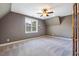 Cozy bedroom with neutral walls, carpet floors, and a ceiling fan at 610 Bennett Mountain, Chapel Hill, NC 27516