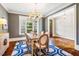 Elegant dining room featuring a chandelier and view to the entry at 610 Bennett Mountain, Chapel Hill, NC 27516