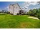 Well-maintained home with spacious backyard, featuring a deck and manicured lawn at 610 Bennett Mountain, Chapel Hill, NC 27516