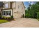 Beautiful home featuring a 2-car garage, mature trees, and professional landscaping at 610 Bennett Mountain, Chapel Hill, NC 27516