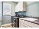 Functional laundry room with modern washer, dryer, and plenty of cabinet space at 610 Bennett Mountain, Chapel Hill, NC 27516