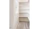 Well-organized walk-in closet featuring built-in shelving, providing plenty of storage space at 610 Bennett Mountain, Chapel Hill, NC 27516