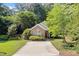 Charming brick home featuring a well-maintained lawn and inviting front entry at 6412 Forest Ridge Dr, Durham, NC 27713