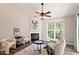 Comfortable living area with fireplace, natural light, and neutral decor at 6412 Forest Ridge Dr, Durham, NC 27713