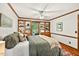 Serene bedroom with hardwood floors, built-in shelves and drawers, a cozy personal retreat at 6728 Glen Forrest Dr, Chapel Hill, NC 27517