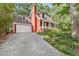 Beautiful two-story home featuring a two-car garage, inviting porch and well-maintained landscaping at 6728 Glen Forrest Dr, Chapel Hill, NC 27517