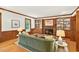 Elegant living room showcasing a fireplace, built-in shelving, and hardwood flooring at 6728 Glen Forrest Dr, Chapel Hill, NC 27517