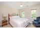 Cozy bedroom featuring neutral colors, soft lighting and lots of natural light at 8512 Barrett Hall Ln, Wake Forest, NC 27587