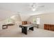 The room has a ceiling fan and lots of space for activities and entertainment, great for having friends over at 8512 Barrett Hall Ln, Wake Forest, NC 27587