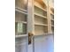 Close up of an elegant built-in shelving with classic white cabinetry at 8512 Barrett Hall Ln, Wake Forest, NC 27587