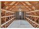 Unfinished attic space with exposed wooden beams ready to be converted at 9 Monteith Ct, Durham, NC 27713