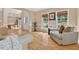 Bright living area with hardwood floors, neutral paint, and large windows at 9 Monteith Ct, Durham, NC 27713