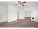 Spacious living room featuring neutral walls, and open doorways at 907 Morehead Ave, Durham, NC 27707