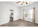 Bright room with large windows, and an open doorway at 907 Morehead Ave, Durham, NC 27707