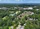 Overhead view of a neighborhood near a park, showcasing the homes and surrounding trees at 922 Tower St, Raleigh, NC 27607