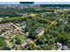 Expansive aerial view highlights the neighborhood's proximity to downtown, shopping, and NC State campus at 922 Tower St, Raleigh, NC 27607