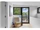 Cozy balcony with a chair and view of the neighborhood at 922 Tower St, Raleigh, NC 27607