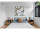 Comfortable bedroom with modern decor, soft lighting, and stylish nightstands at 922 Tower St, Raleigh, NC 27607