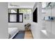 Sleek bedroom with ample storage and a view of the outside at 922 Tower St, Raleigh, NC 27607