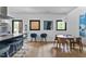Bright dining area with modern furniture and artwork at 922 Tower St, Raleigh, NC 27607