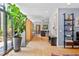 Open-concept living area featuring hardwood floors, modern decor, and seamless access to the kitchen at 922 Tower St, Raleigh, NC 27607