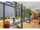 Indoor/outdoor space with seamless transition to a modern patio area featuring a seating area at 922 Tower St, Raleigh, NC 27607
