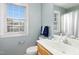 Updated bathroom with a modern vanity, sink, and stylish fixtures at 9416 Buggy Run Cir, Wake Forest, NC 27587