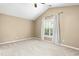 Spacious bedroom with vaulted ceilings, neutral carpet and a bright window view at 9416 Buggy Run Cir, Wake Forest, NC 27587
