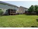 Large, well-maintained backyard with a screened porch and ample space at 1035 Evening Shade Ave, Rolesville, NC 27571