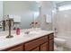 Well-maintained bathroom featuring a vanity and shower-tub combo at 1035 Evening Shade Ave, Rolesville, NC 27571