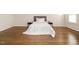 Spacious bedroom with hardwood floors and a bright airy feel at 1035 Evening Shade Ave, Rolesville, NC 27571
